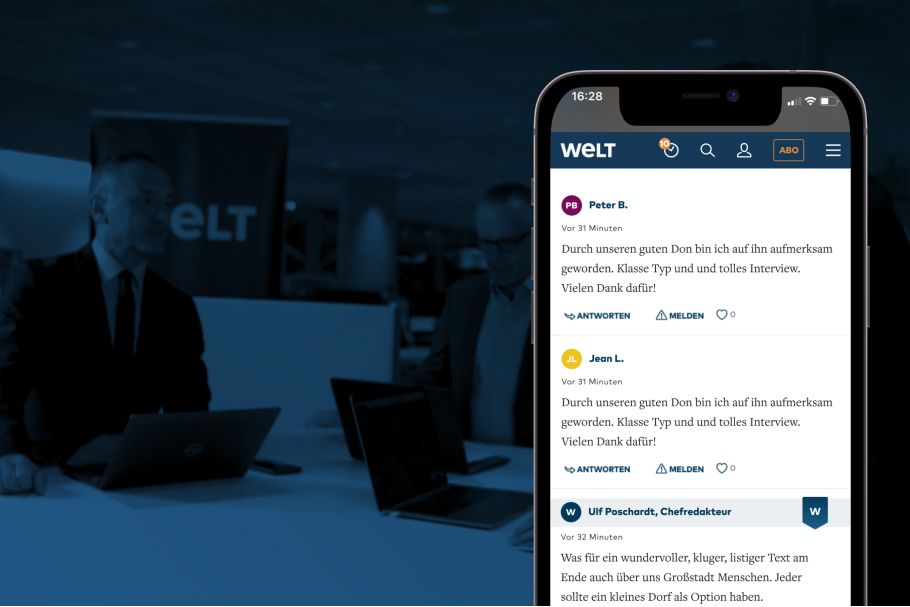 WELT Community Ansicht auf einem Smartphone vor einem Büro Hintergrund